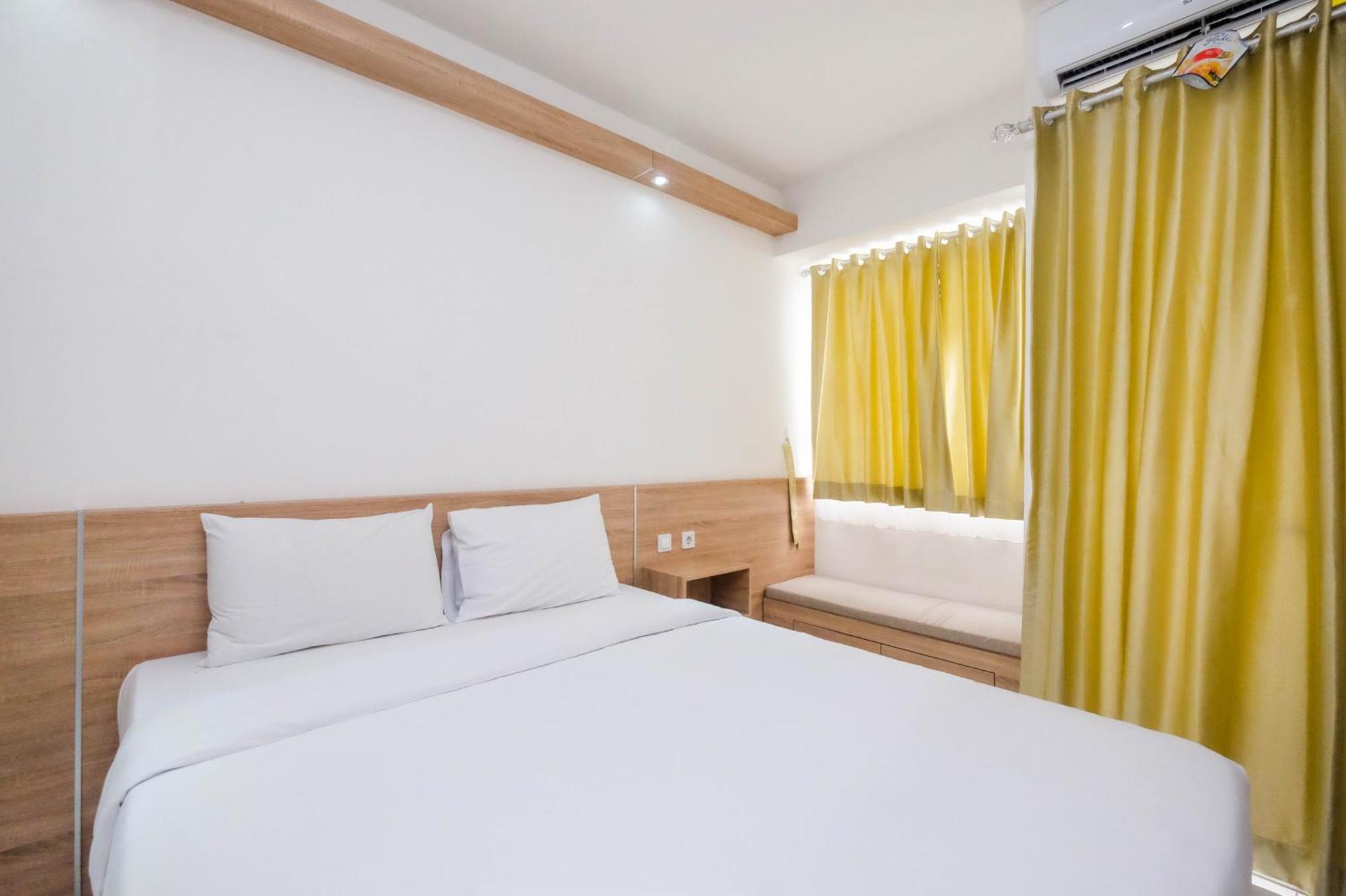 Apartemen New And Modern At Riverview By Travelio
