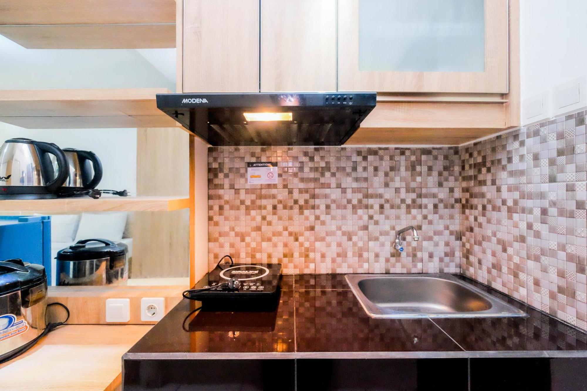 Apartemen New And Modern At Riverview By Travelio