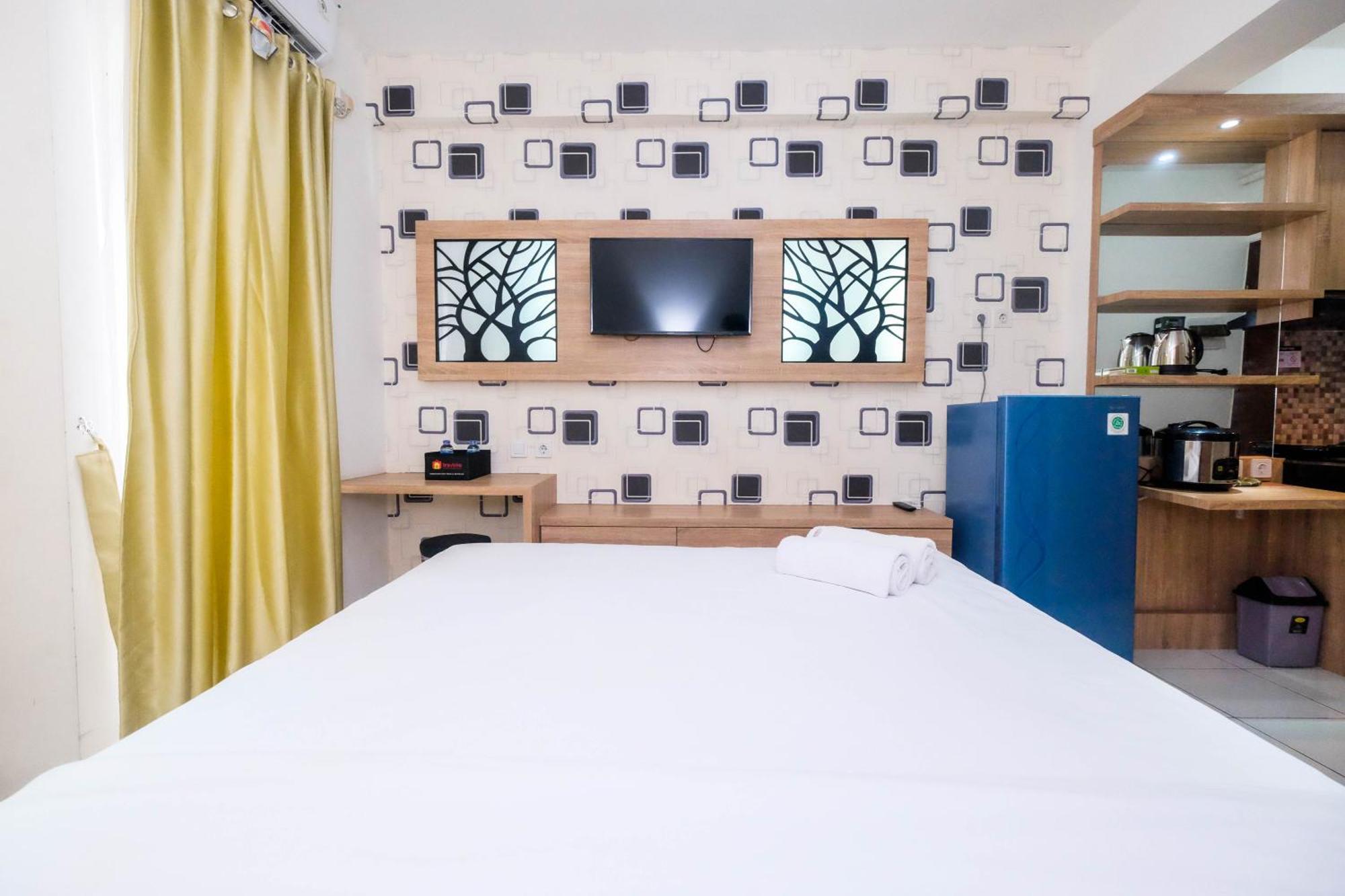 Apartemen New And Modern At Riverview By Travelio